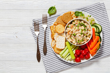 salmon salad with fresh veggies and crackers