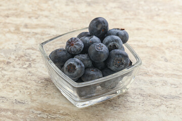 Sweet ripe blueberry heap in the bowl