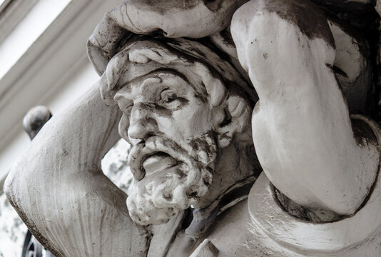 Titan and Atlantean holds the world on his back. Greek mythology. (statue of the end of the eighteenth century)	
