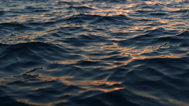 Reflection of sunlight over sea surface in slow motion