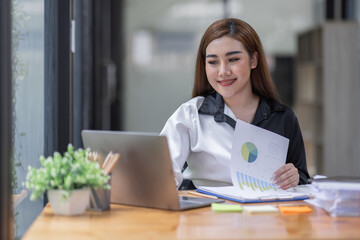 Business Documents, Auditor businesswoman checking searching document legal prepare paperwork or report for analysis TAX time,accountant Documents data contract partner deal in workplace office	