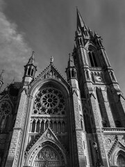 Catholic Cathedral in Ireland, Gothic style. The Cathedral Church of St Colman known as Cobh Cathedral, or Queenstown Cathedral, single-spire cathedral. Roman Catholic cathedral. Black and white