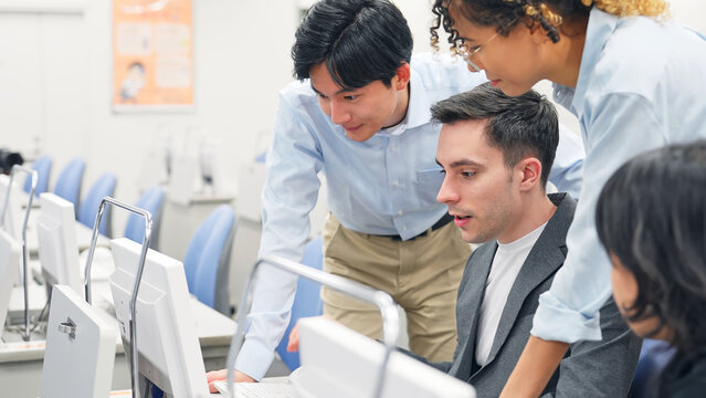 Multinational group having a conversation in the office. International school. Global business.