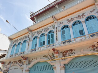 Photograph of the front of the Sino-Portuguese architectural building beautiful colors in the daytime