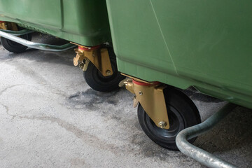 closeup description of heavy duty casters (large wheelie bins) stock images, selective...