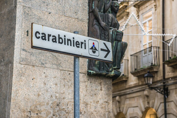 Obraz premium Carabinieri sign on Ortygia island, Syracuse, Sicily Island, Italy