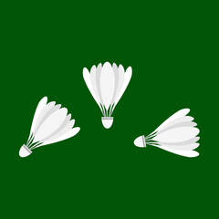 Badminton shuttlecock on green in flat vector illustration design