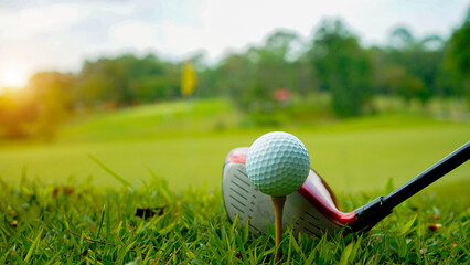 Golf ball and golf club in beautiful golf course at Thailand.