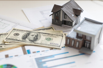 Miniature paper house with money