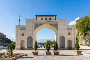 Historical Quran Gate at Allahu Akbar gorge with the city on background, Shiraz, Fars Province, Iran. Tourist attraction.