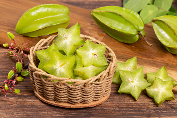 Star fruit or Carambola Green - Averrhoa Carambola; Photo On Wooden Background