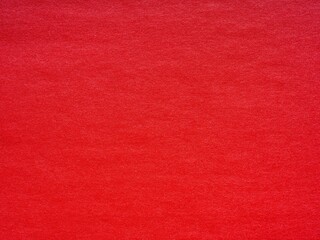 Contrast red paper background. Blank page pattern of designer cardboard.