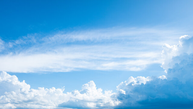 Beautiful blue clear sky with white cloud and sunshine background. © ant