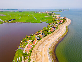 High angle Drone Point of View on the small village of Uitdam, Netherlands, just north of capital...