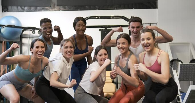 Multiethnic group boxing class posing and joking