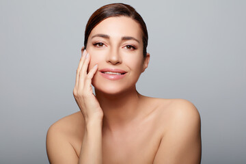 Skin care. Beautiful middle-aged woman with healthy flawless skin