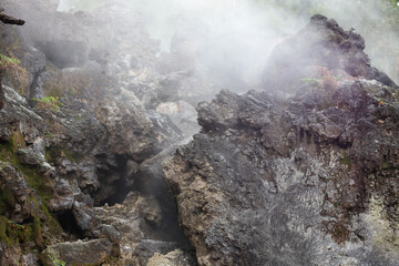 geothermal smoke vapor that comes out of the gaps in the rocks produces sulfur