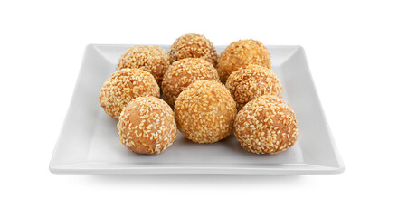 Plate of delicious sesame balls on white background