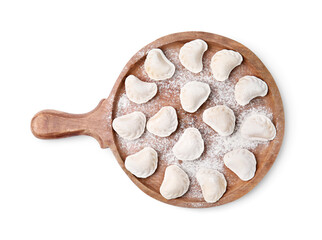 Raw dumplings (varenyky) with tasty filling and flour on white background, top view