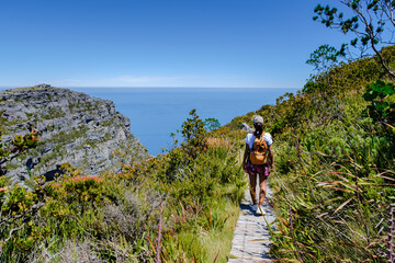 view from the Table Mountain in Cape Town South Africa, view over the ocean, and Lion's Head from...