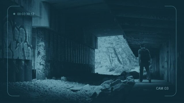 CCTV Man With Backpack Walking Beneath Highway Bridge
