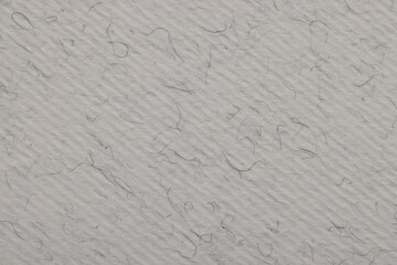 Texture of light grey paper sheet as background, top view