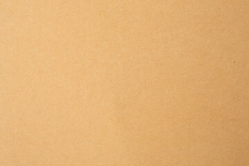 Texture of beige paper sheet as background, closeup