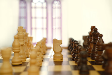 wooden chess pieces, duel queen figures on chessboard blackboard, concept supreme power, victory,...