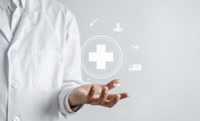 Health insurance concept. Doctor in a white coat uniform hand holding plus and healthcare medical...