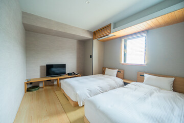 ホテルのツインベッドルーム