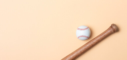 Baseball bat and ball on beige background. Horizontal sport theme poster, greeting cards, headers, website and app