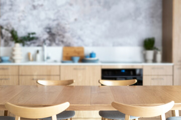 wood tabletop with blank space in contemporary kitchen