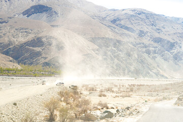mountain road at Ladakh India with view of the Himalayan mountain range.