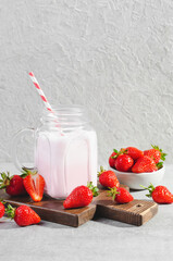 Strawberry Drink, Shake, Smoothie with Fresh Strawberry on Grey Background, Glass with Tasty Refreshing Drink