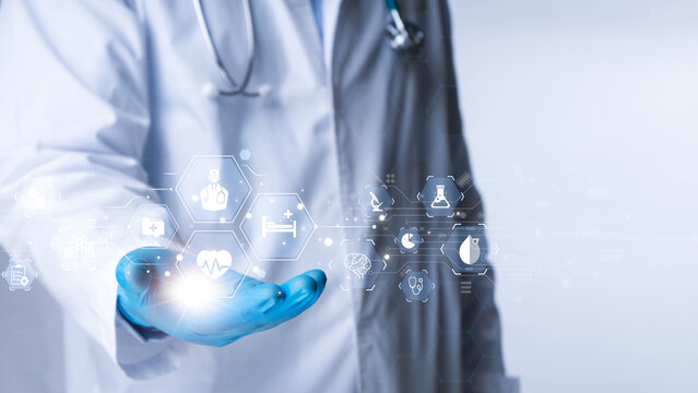 Medical worker touch medical healthcare icon displayed on a technology interface. Virus pandemic develop people awareness and spread attention on their healthcare in global.