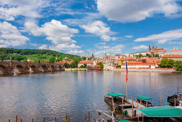 View of Prague Mala Strana old district and River Vltava with the famous Charles Bridge, Petrin Hill, and St Vitus Cathedral