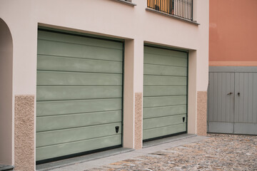 Garage door. Luxury and modern house with double garage door in Europe.