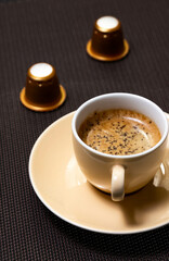 Espresso coffee cup with capsules
