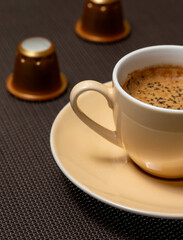 Espresso coffee cup with capsules