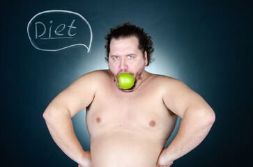Fototapeta premium Funny fat man on a diet. Healthy lifestyle and sports.