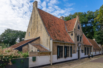 The former almshouse, now a restaurant, next to the old Nicholas Church on the Kerkplein on the island of Vlieland