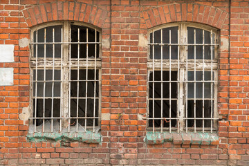 Fototapeta na wymiar The Imperial Shipyard Trail - window of abandoned destroyed hall. Gdansk, Poland.
