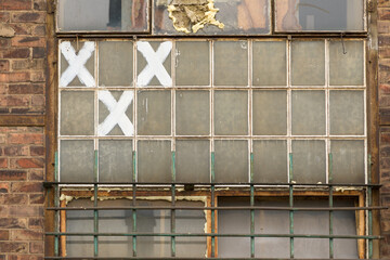 The Imperial Shipyard Trail - window of abandoned destroyed hall. Gdansk, Poland.