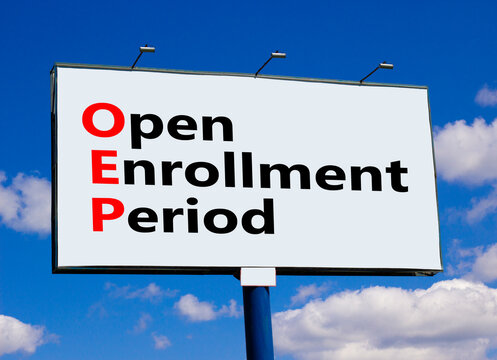 OEP symbol. Concept words OEP Open enrollment period on beautiful big billboard. Beautiful blue sky cloud background. Medical and OEP Open enrollment period concept. Copy space.