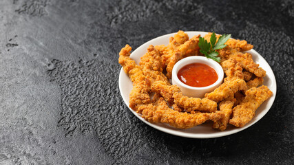 Crispy Shredded Chicken served with sweet chilli sauce. Party finger food snack concept