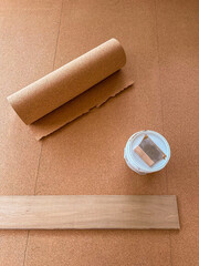 Cork is laid on the floor to insulate against impact sound.