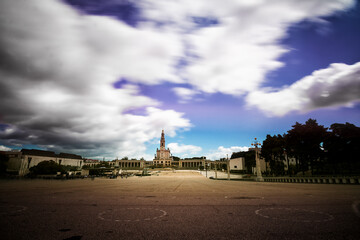 Square with faithful in front of the Sanctuary of Fatima in Portugal in a long exposure shot
