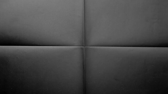 cold led light is moving over folded copy paper with dark toner ink on it, cool printed photo effect overlay via blend mode.