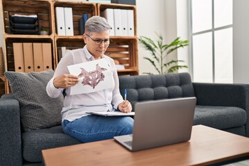 Middle age woman psychologist having online rorscharch test at pyschology center