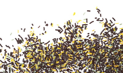 Colorful chocolate sprinkles pile, frame granules isolated on white, top view 